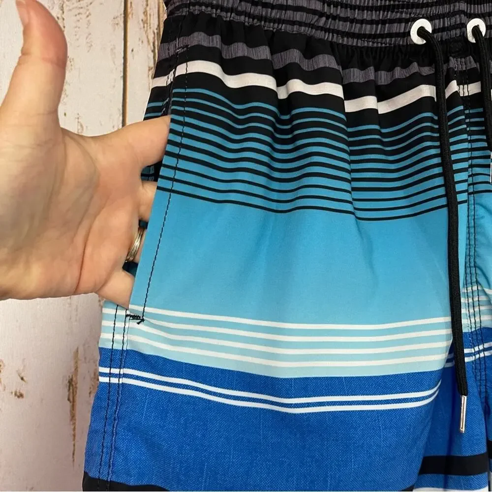 Milan Kerr, Swim Trunks. Size Medium. In excellent condition!